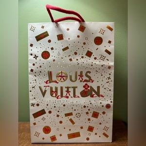 Louis Vuitton Large Paper Shopping Bag from Holiday 2023 collection red and gold